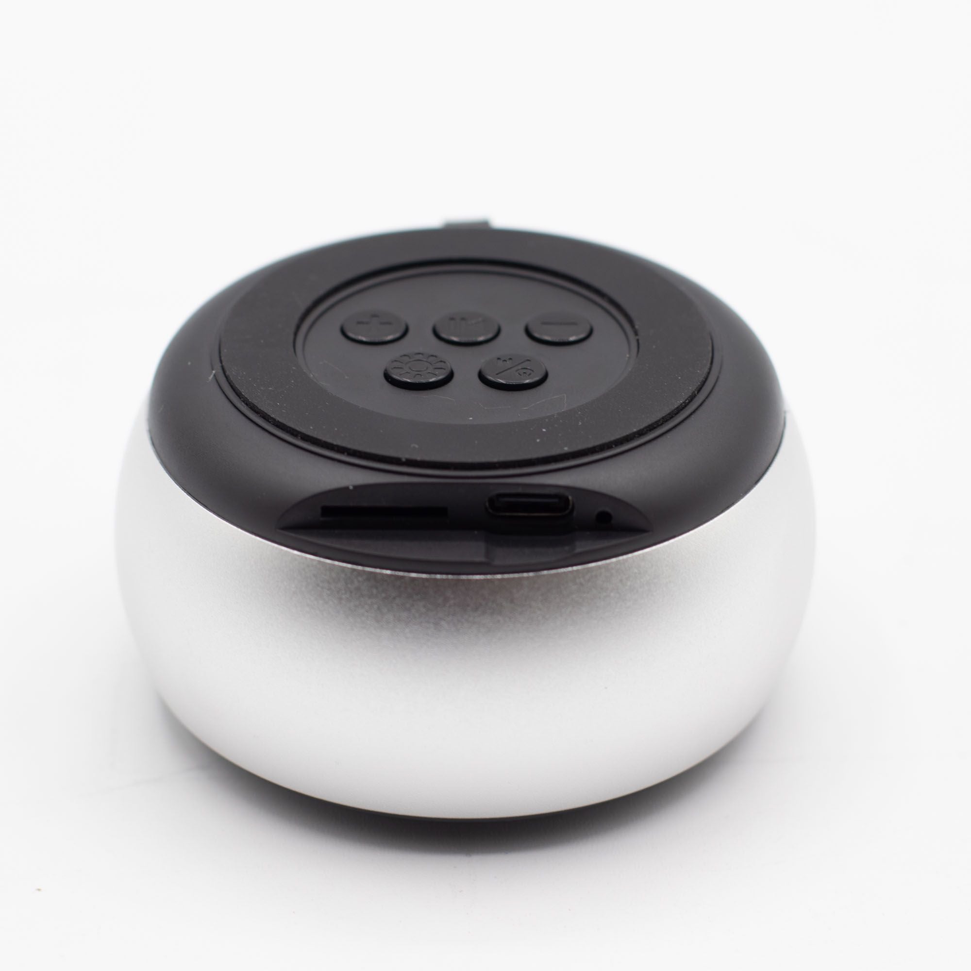 Altavoz mini plateado con efecto de iluminación Mandela