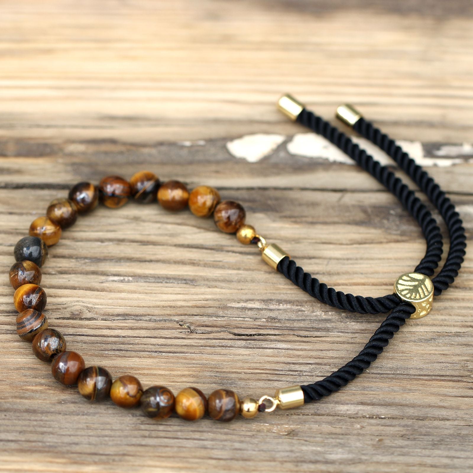 Pulsera de hilo negro con Ojo de Tigre